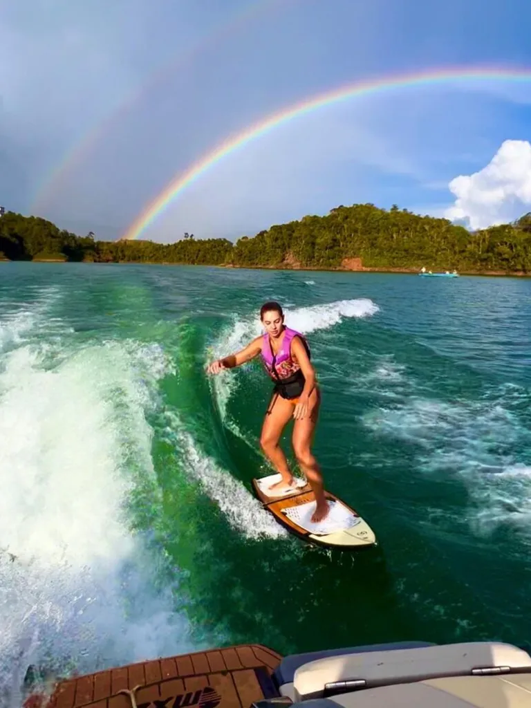 Wakesurfing on the boat's wave on the reservoir.
